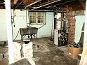 Original dreary basement never changed;  tubs were the entire laundry since 1932.