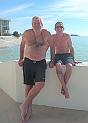 Dad with Eric on wall of Lido One pool area.